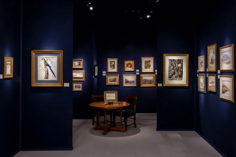 Visitors viewing British women artists works at the Karen Taylor Fine Art stand, Masterpiece 2022