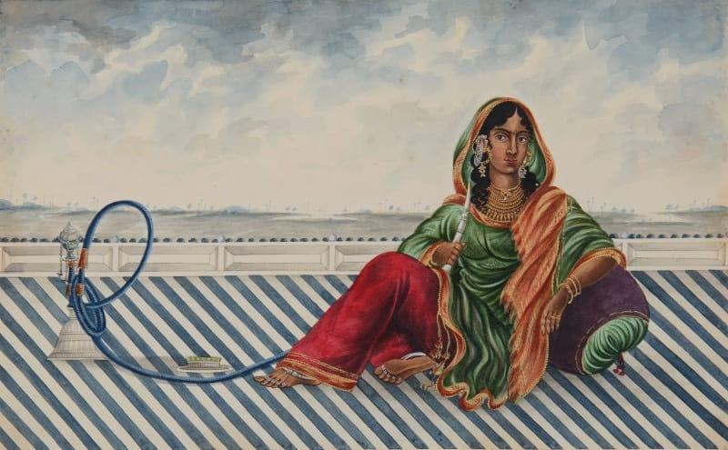 Patna School - A seated lady with a hookah in a landscape