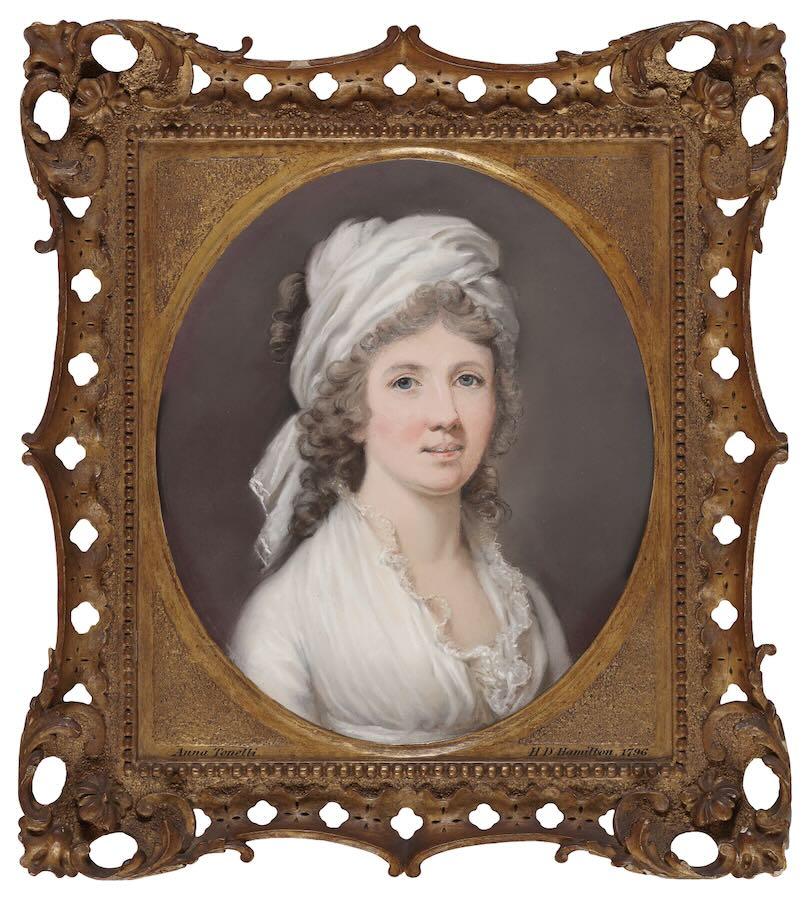 Portrait of a lady in a white headdress wearing a white dress - Main image